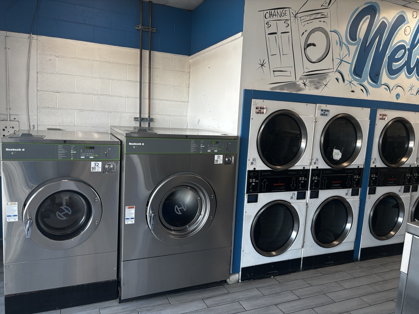 Large commercial Huebsch washers at Plaza Coin Laundry