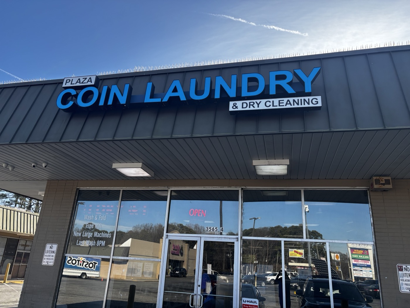 Plaza Coin Laundry storefront on Martin Luther King Jr. Drive, Atlanta